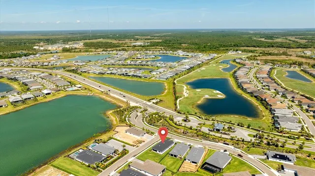 a view of a city with an ocean
