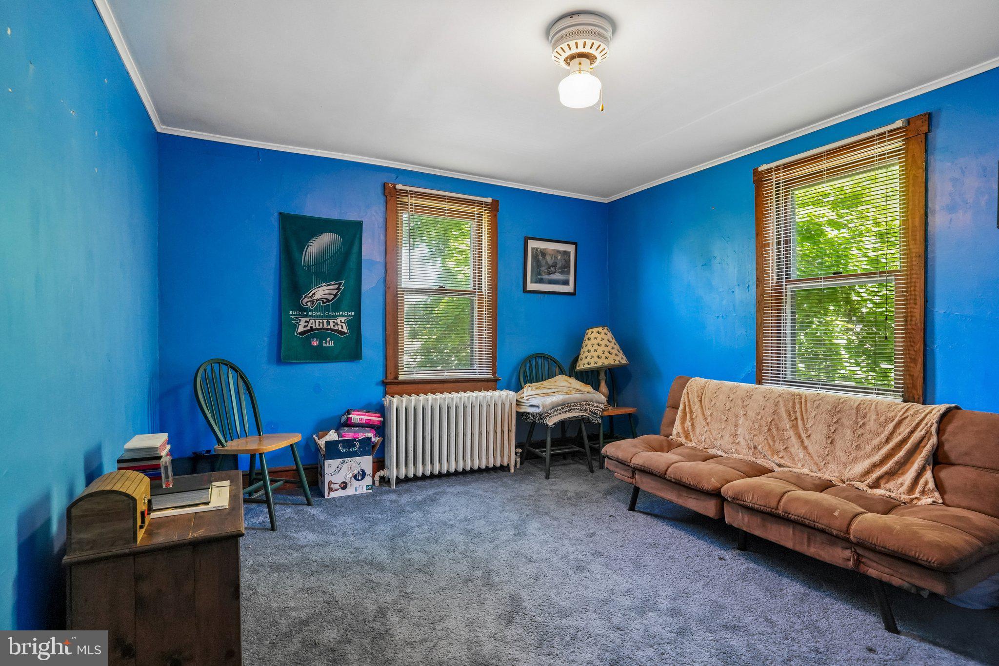 361 Democrat Road Gibbstown, NJ 08027 - Photo 19 of 26 Vibrant blue walls invite creativity.