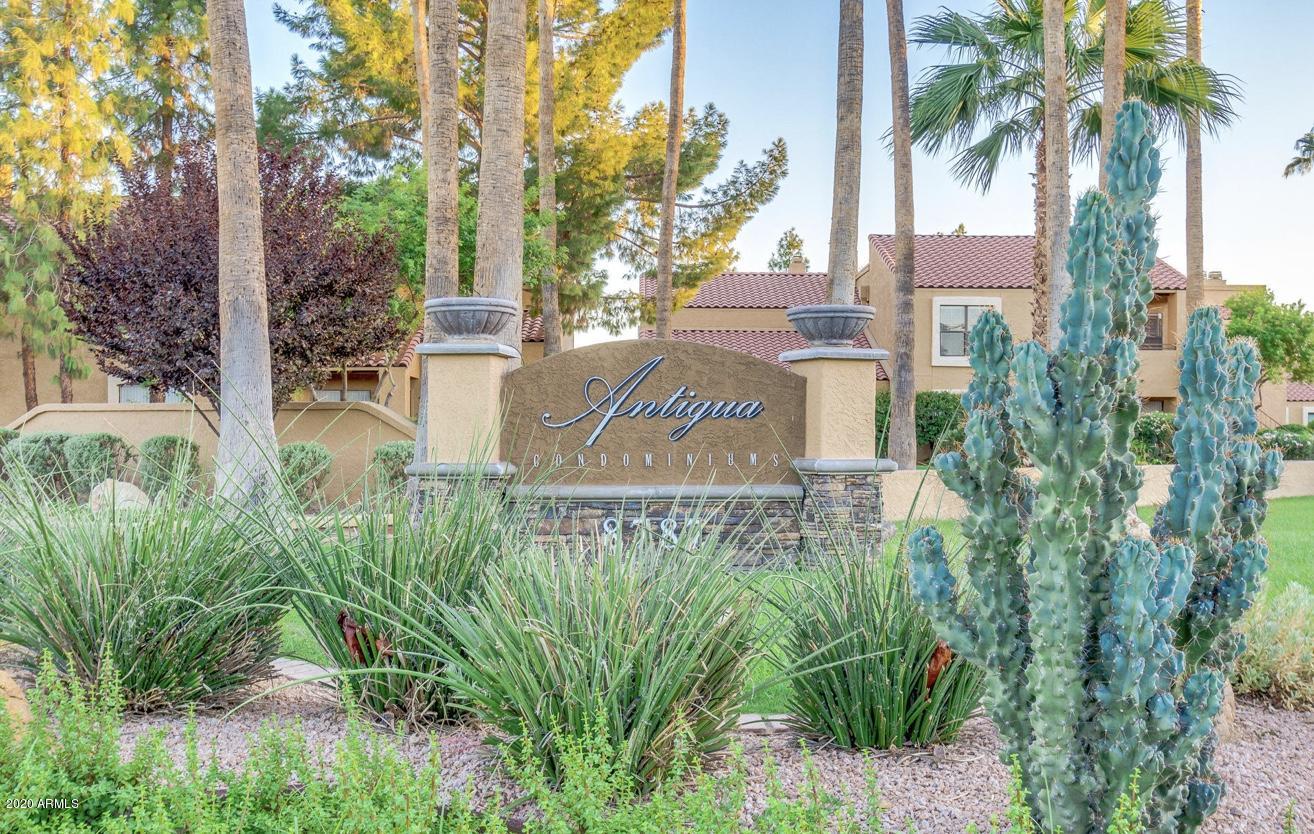 8787 East Mountain View Road, Unit 1034 Scottsdale, AZ 85258 - Photo 1 of 43 a sign that is on the side of a road