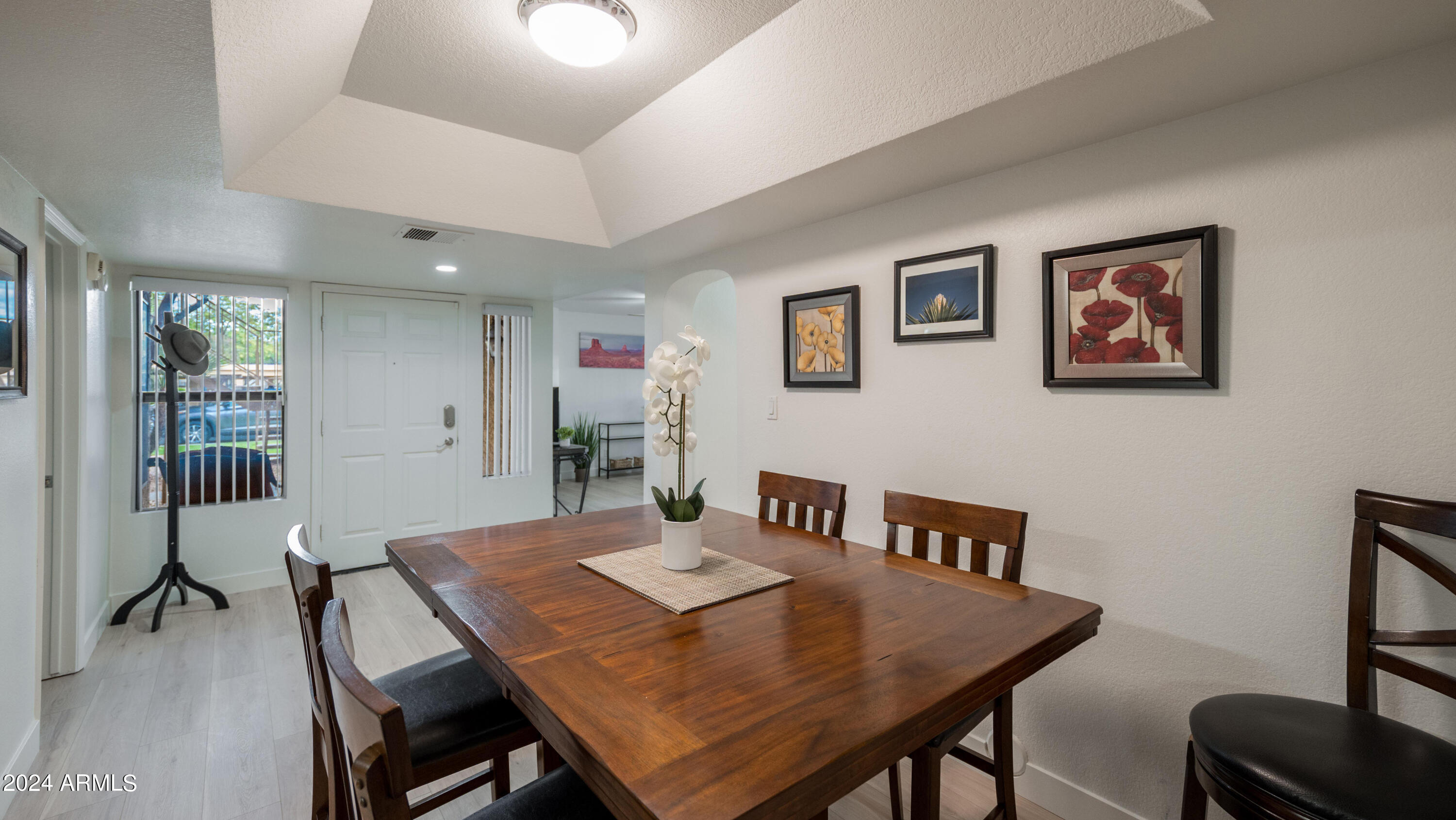 8787 East Mountain View Road, Unit 1034 Scottsdale, AZ 85258 - Photo 13 of 43 a view of a dining room with furniture