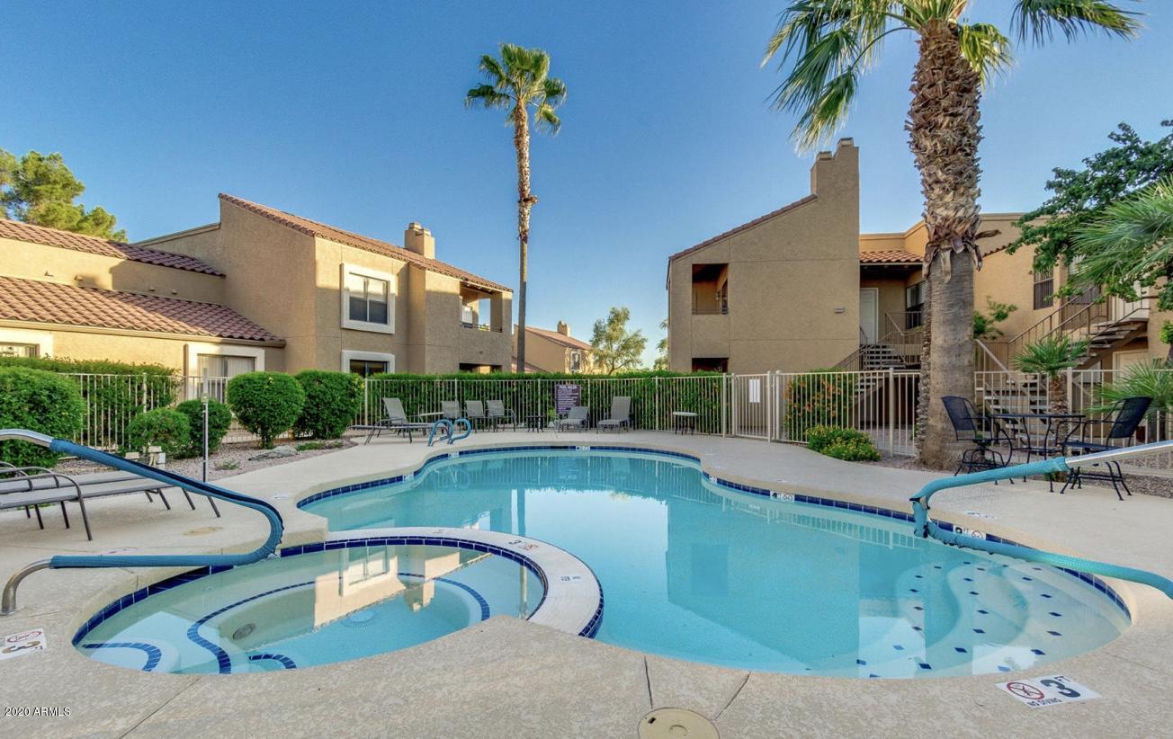 8787 East Mountain View Road, Unit 1034 Scottsdale, AZ 85258 - Photo 30 of 43 a view of a house with swimming pool