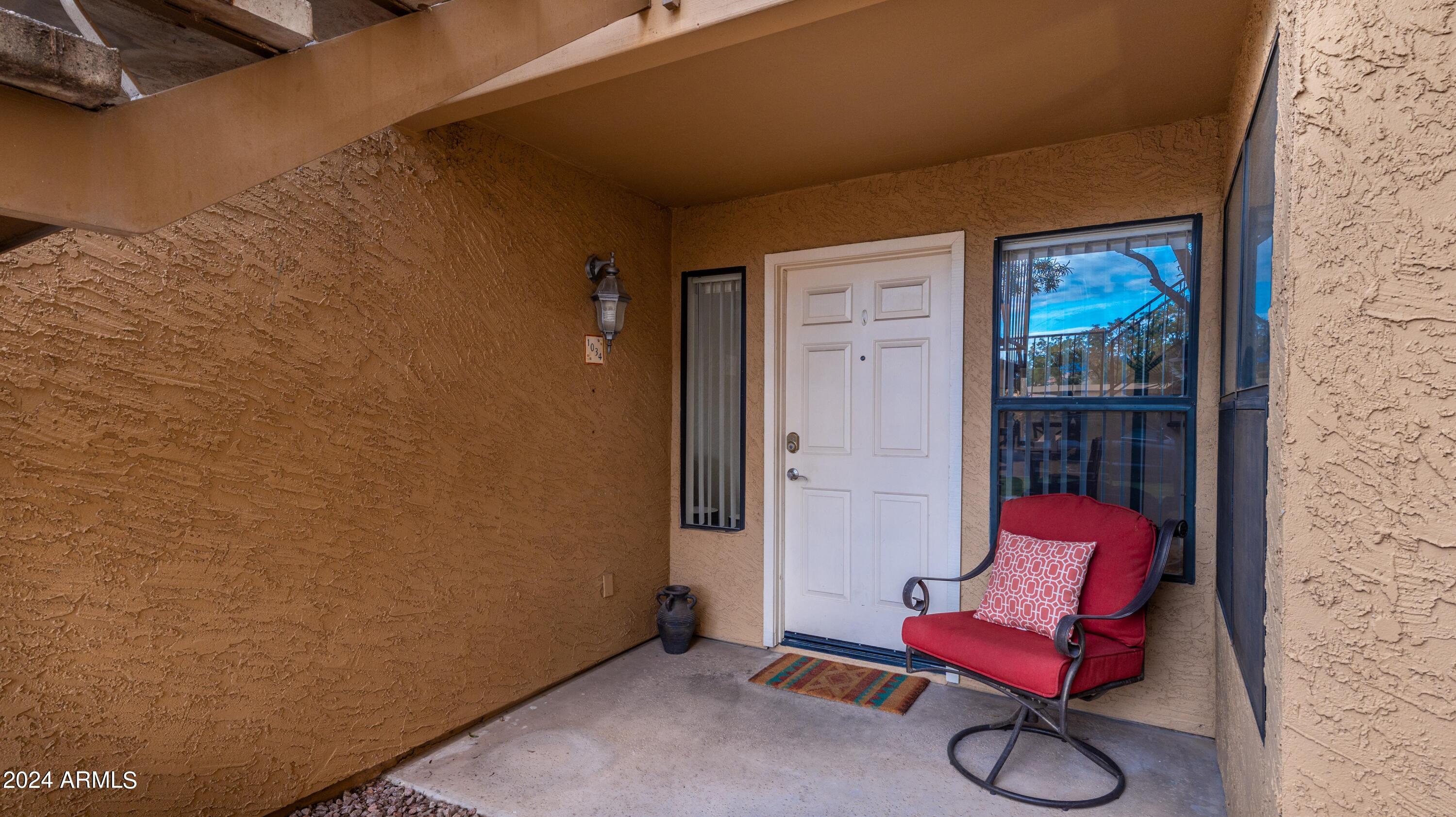 8787 East Mountain View Road, Unit 1034 Scottsdale, AZ 85258 - Photo 3 of 43 a view of a two chairs in the room