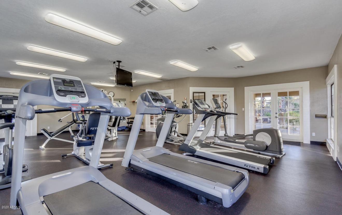 8787 East Mountain View Road, Unit 1034 Scottsdale, AZ 85258 - Photo 32 of 43 a view of a room with gym equipment