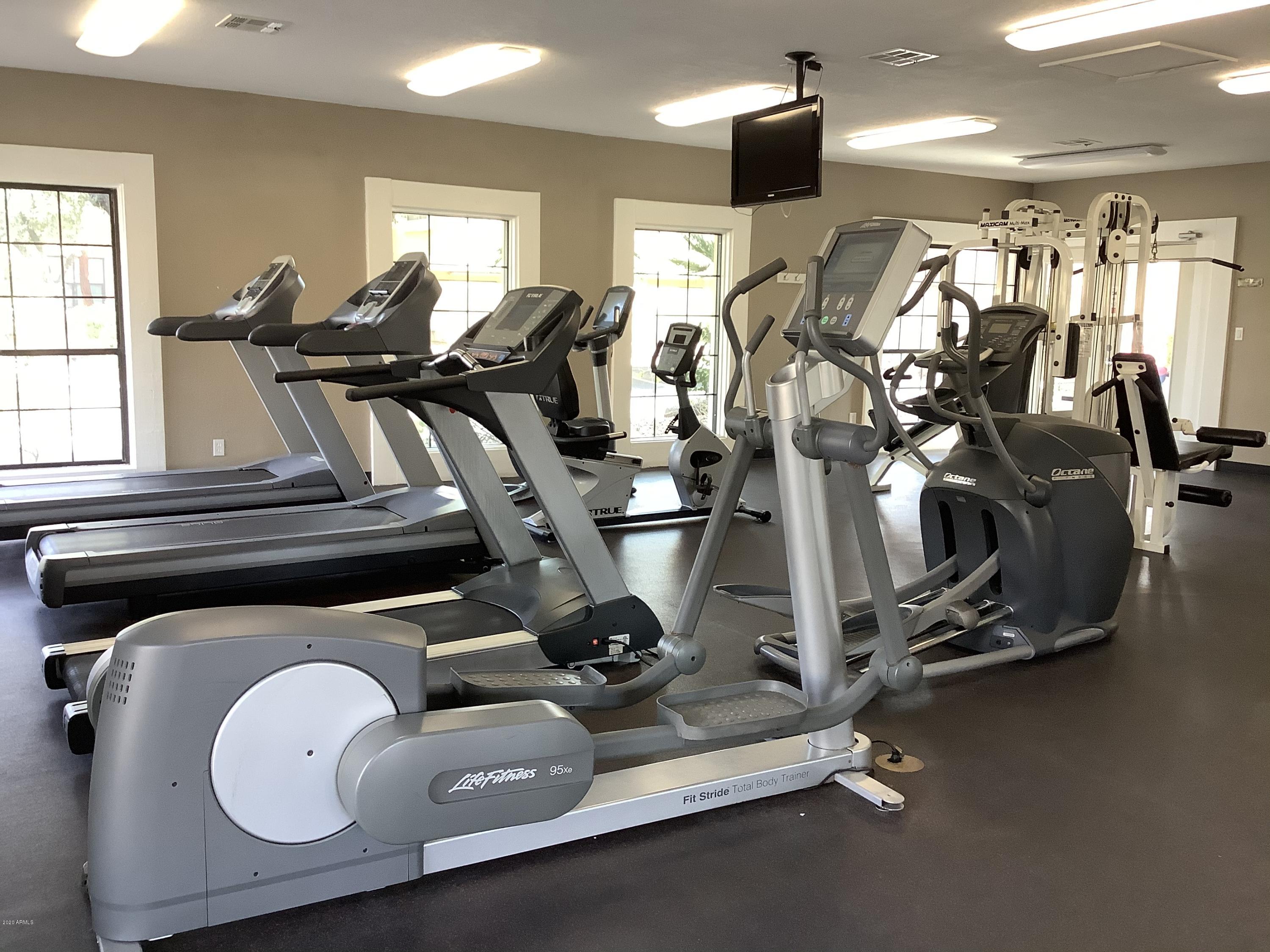 8787 East Mountain View Road, Unit 1034 Scottsdale, AZ 85258 - Photo 33 of 43 a view of a room with gym equipment