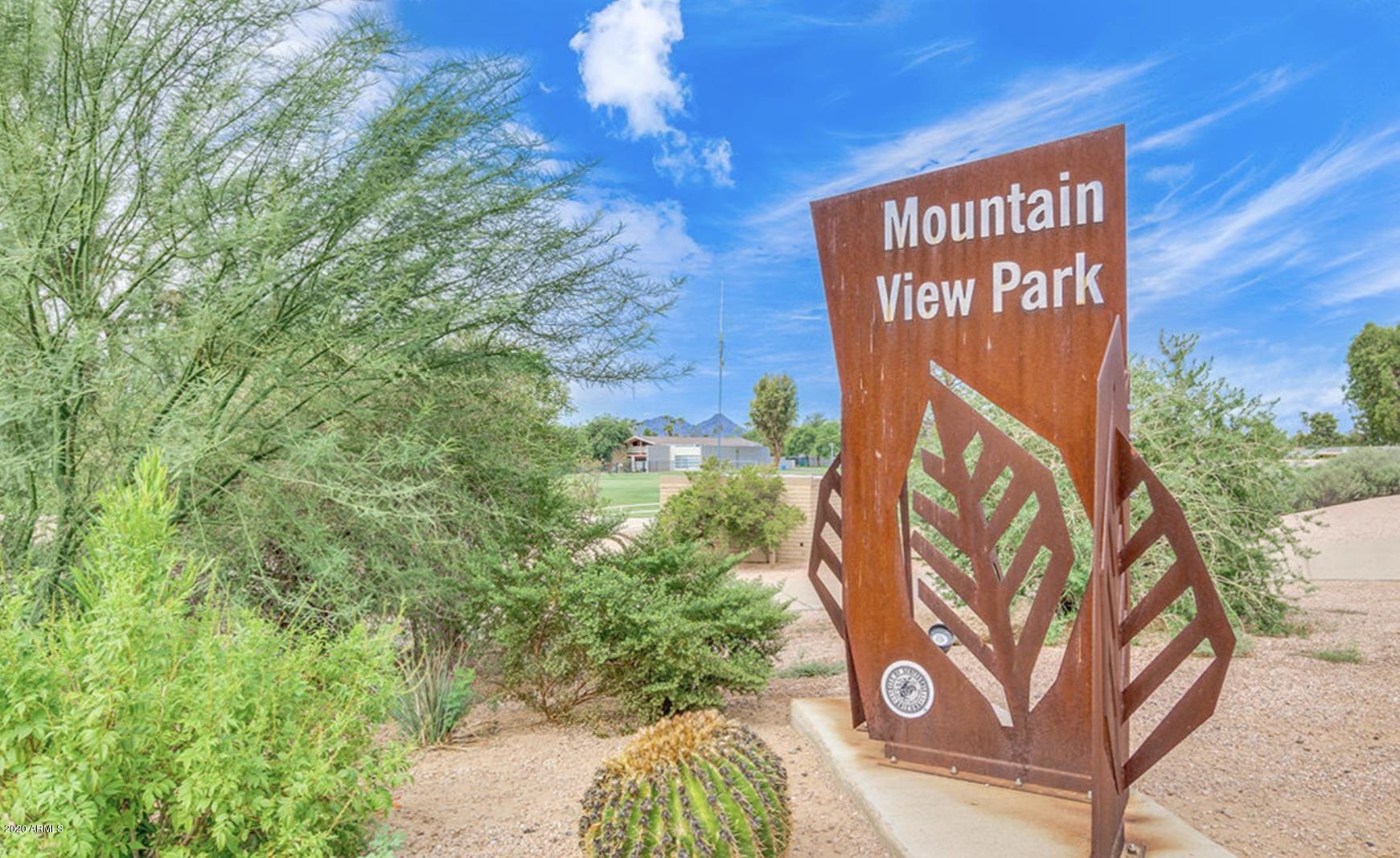 8787 East Mountain View Road, Unit 1034 Scottsdale, AZ 85258 - Photo 40 of 43 a sign that is on a pole
