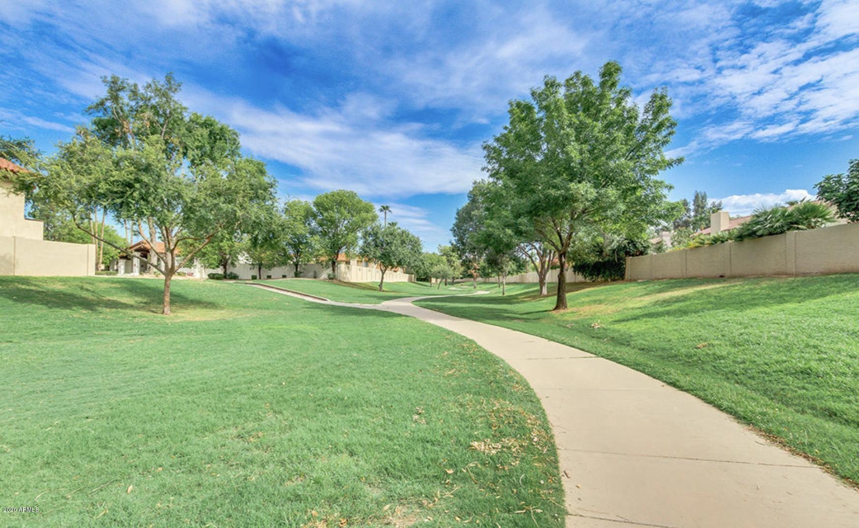 8787 East Mountain View Road, Unit 1034 Scottsdale, AZ 85258 - Photo 41 of 43 a view of a park with large trees