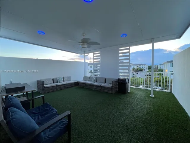 a room with furniture and wooden floor