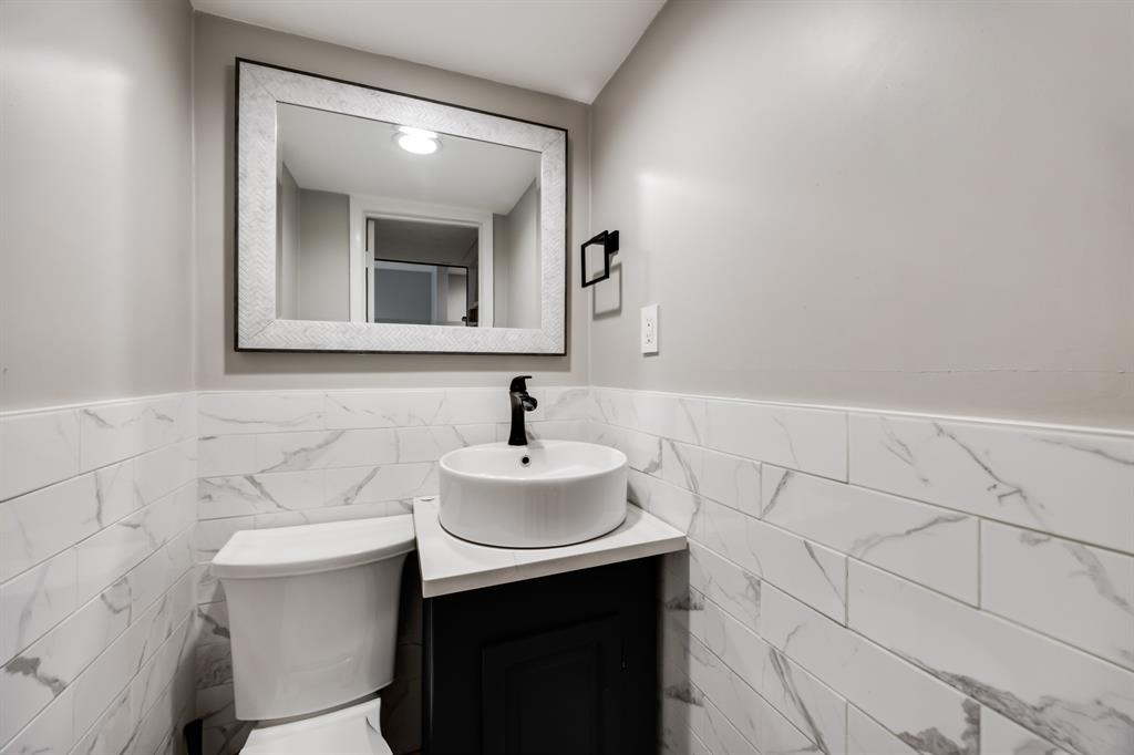 3500 Routh Street, Unit 6 Dallas, TX 75219 - Photo 13 of 17 Half bathroom on first floor.