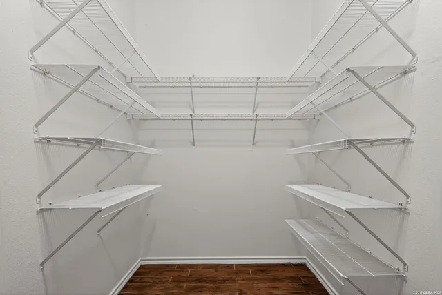 a view of a room with racks on the wall