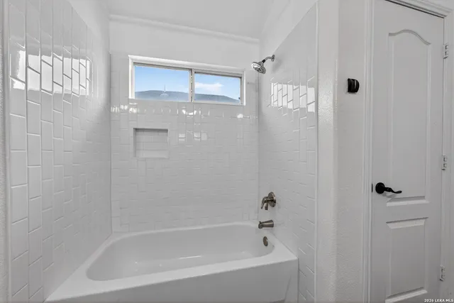 a close up of a bathtub curtain