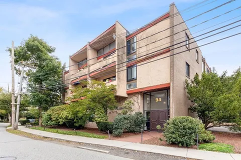 a view of a building along the street