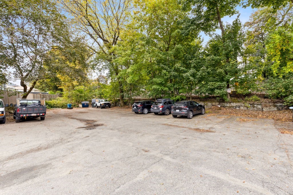 94 Beaconsfield Road, Unit 201 Brookline, MA 02445 - Photo 12 of 13 a car parked on the side of the road
