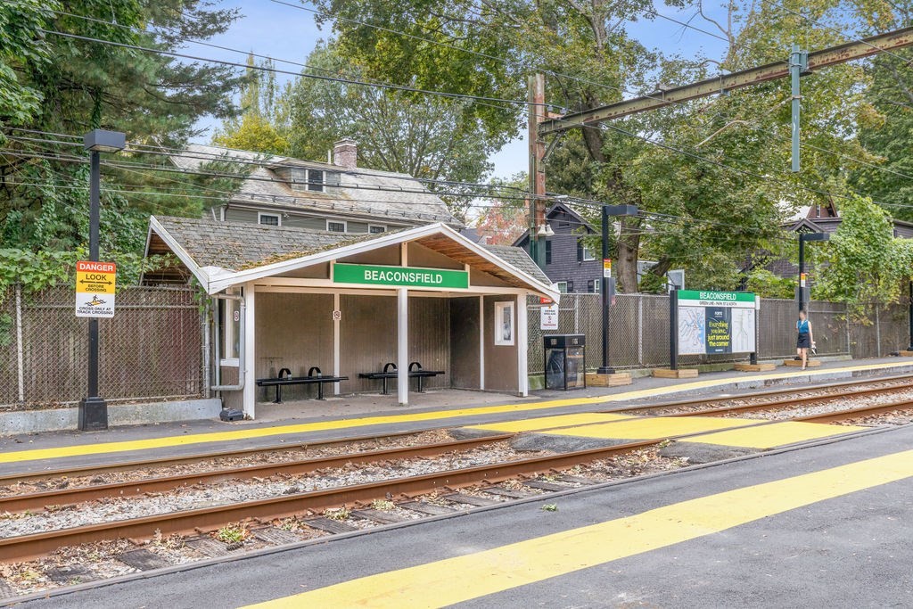 94 Beaconsfield Road, Unit 201 Brookline, MA 02445 - Photo 13 of 13 a view of a house with a swimming pool