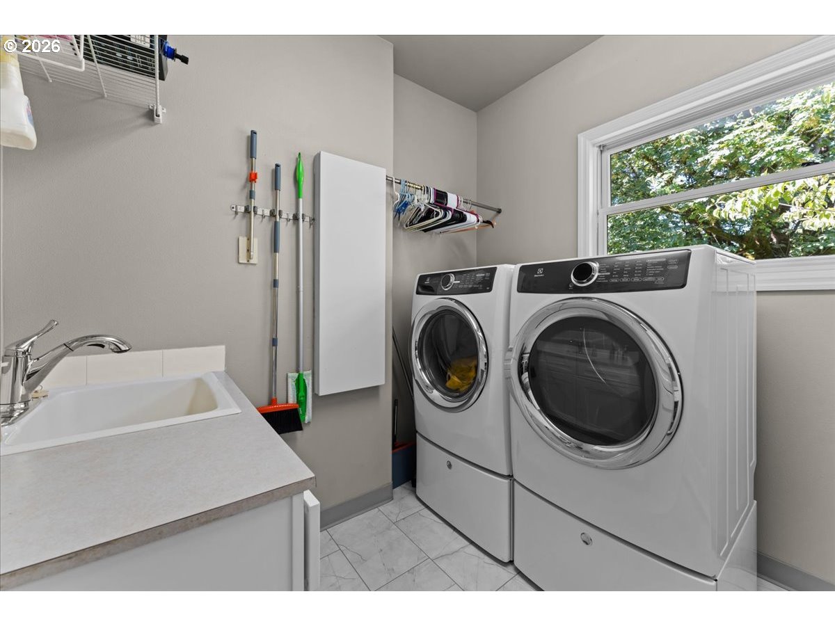 37123 Northeast Reed Road Corbett, OR 97019 - Photo 29 of 48 a utility room with dryer and washer