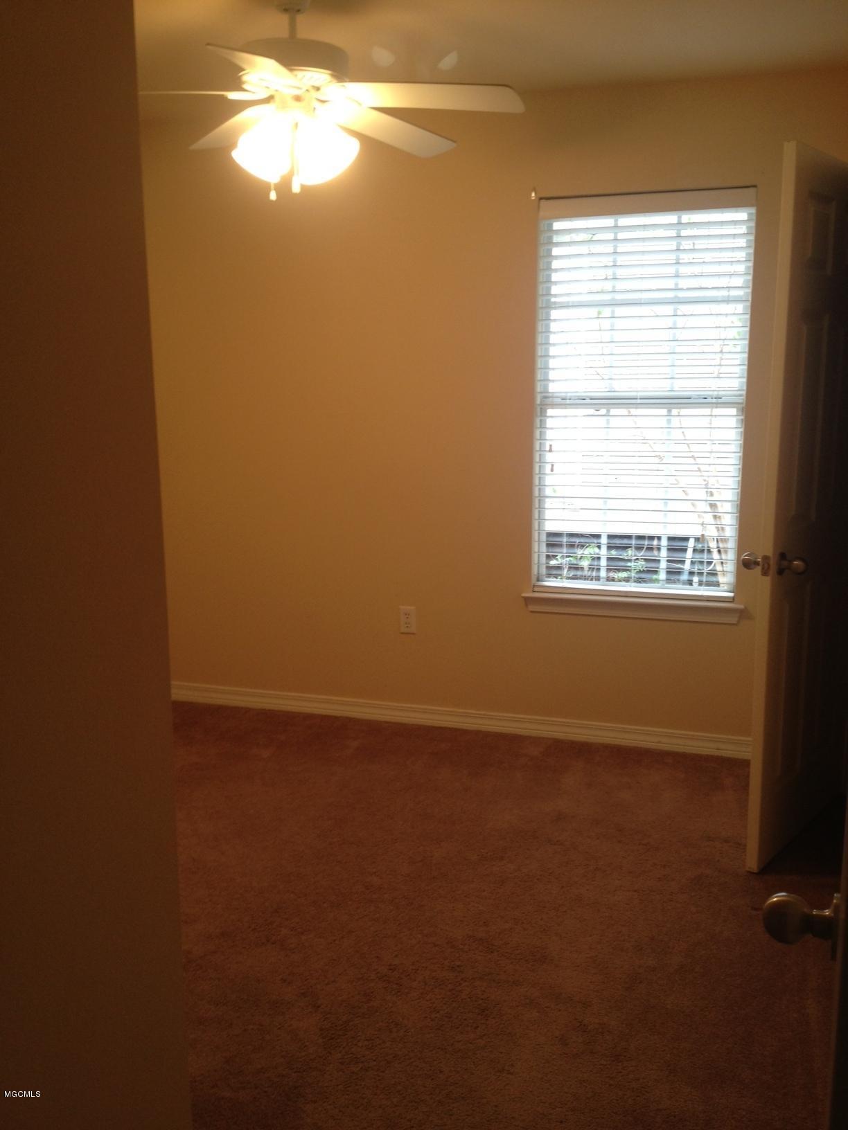 16089 Cook Road, Unit A B C D Biloxi, MS 39532 - Photo 10 of 24 BEDROOM FRONT 1 14
