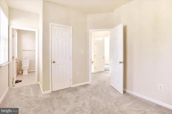 a view of a bathroom with toilet