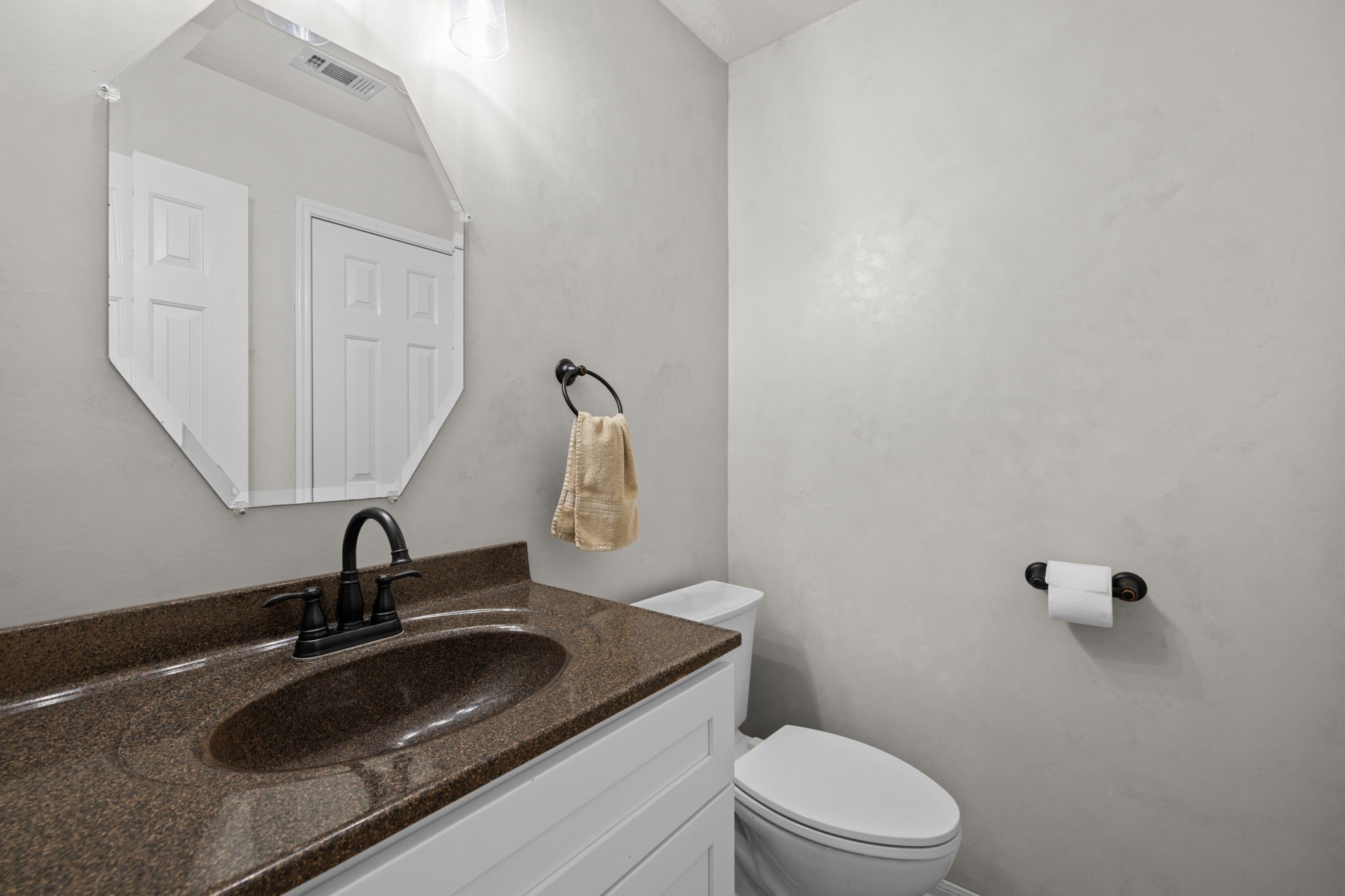 19114 Emory Trail Spring, TX 77388 - Photo 19 of 44 a bathroom with a sink toilet and mirror