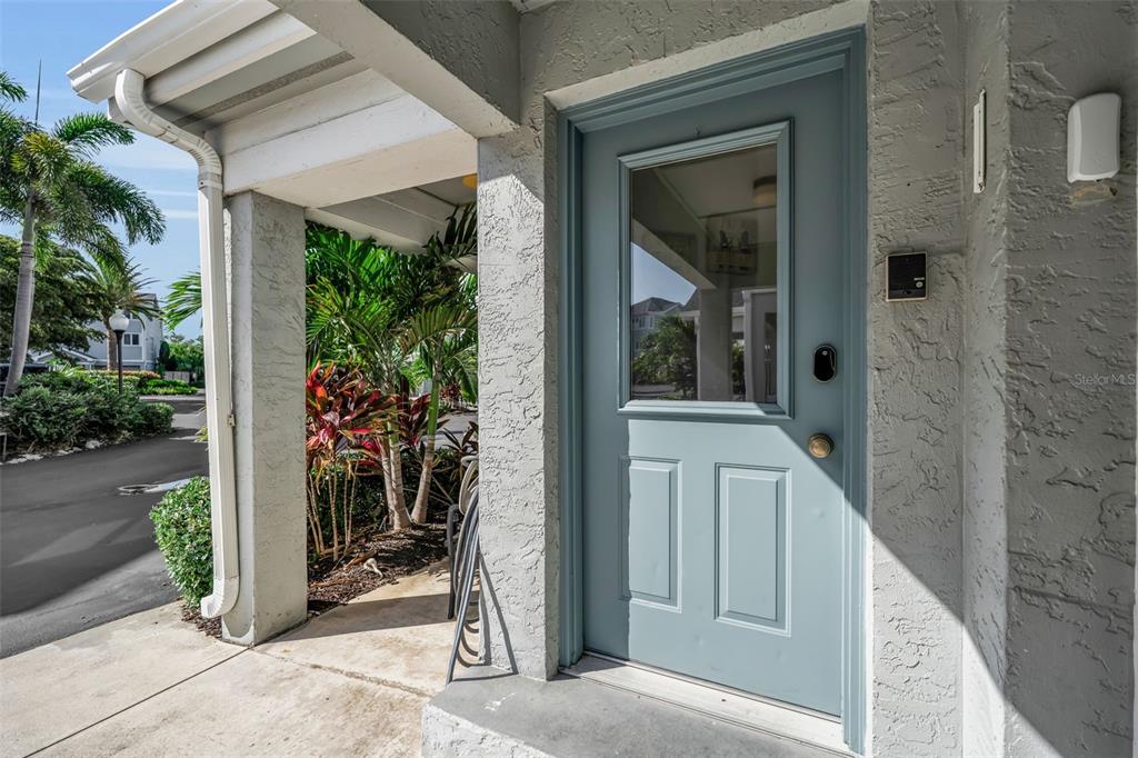 848 Evergreen Way Longboat Key, FL 34228 - Photo 62 of 66 a view of a entryway door front of house