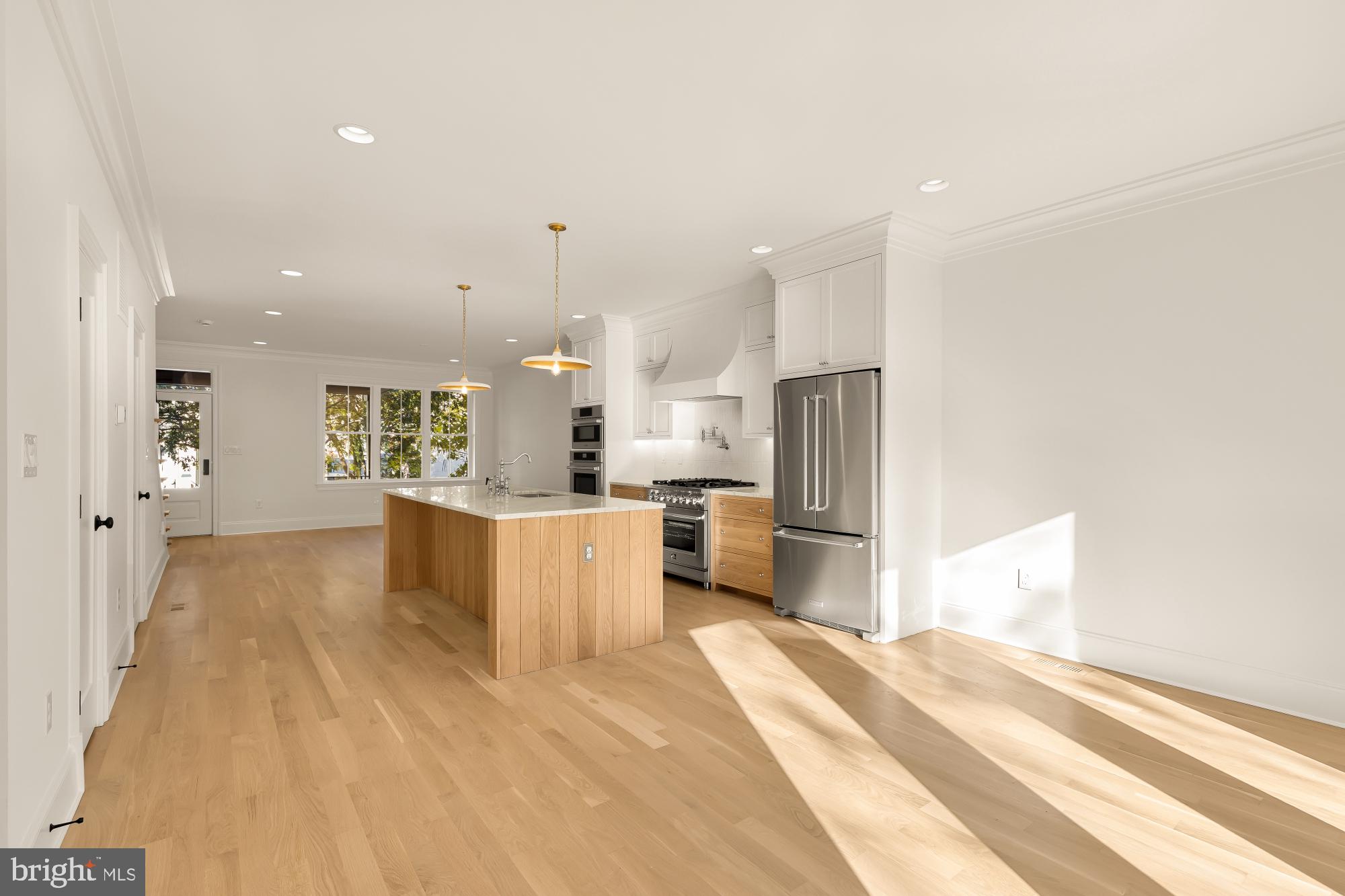 1412 Perry Place Northwest Washington, DC 20010 - Photo 22 of 52 a view of kitchen with kitchen island white cabinets and stainless steel appliances