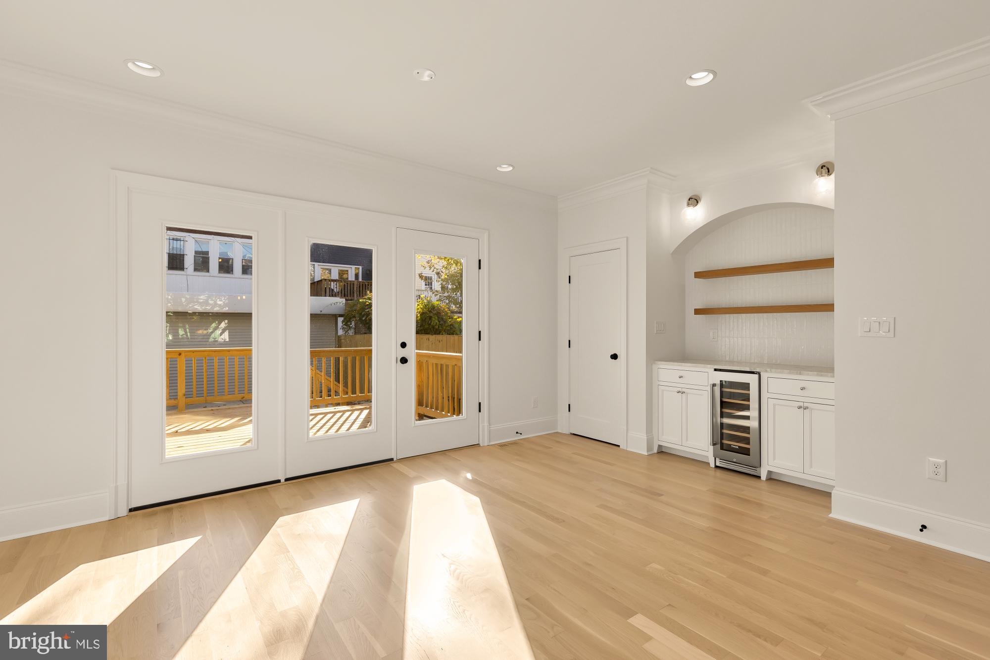 1412 Perry Place Northwest Washington, DC 20010 - Photo 24 of 52 a view of an empty room with a window and fire place