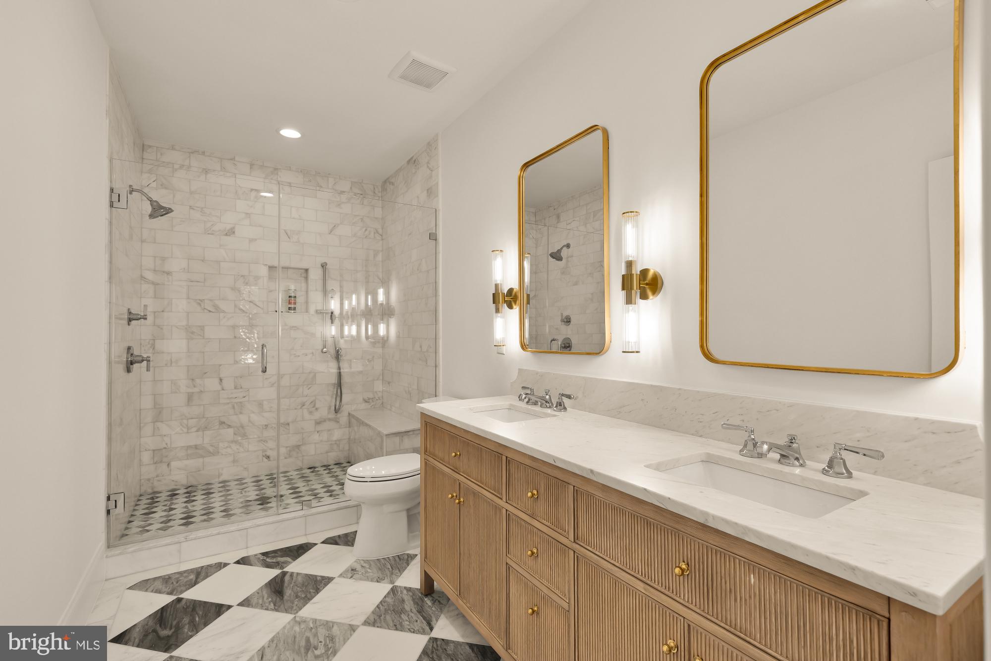 1412 Perry Place Northwest Washington, DC 20010 - Photo 29 of 52 a bathroom with a granite countertop sink mirror and shower
