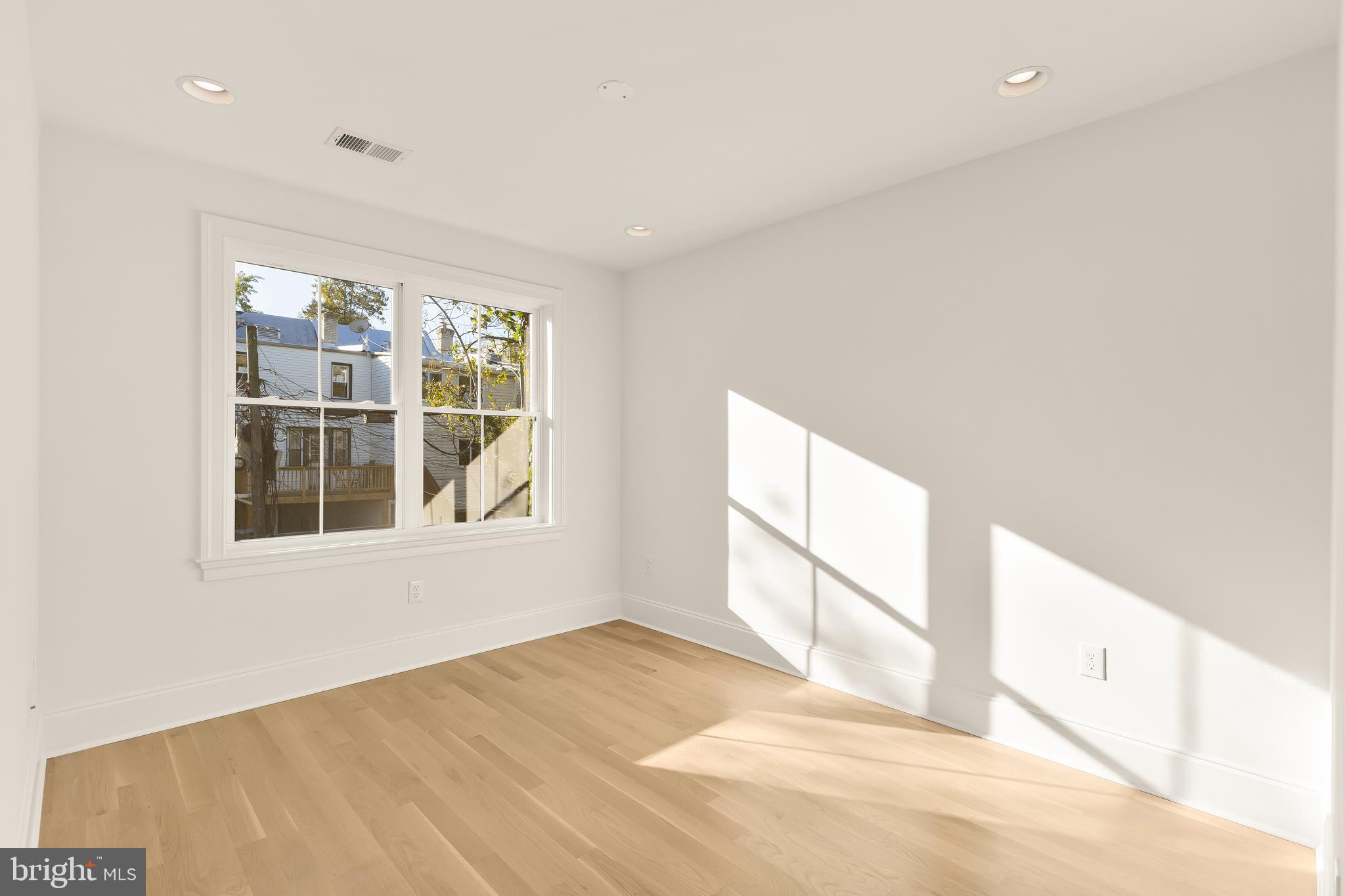 1412 Perry Place Northwest Washington, DC 20010 - Photo 37 of 52 a view of an empty room with a window