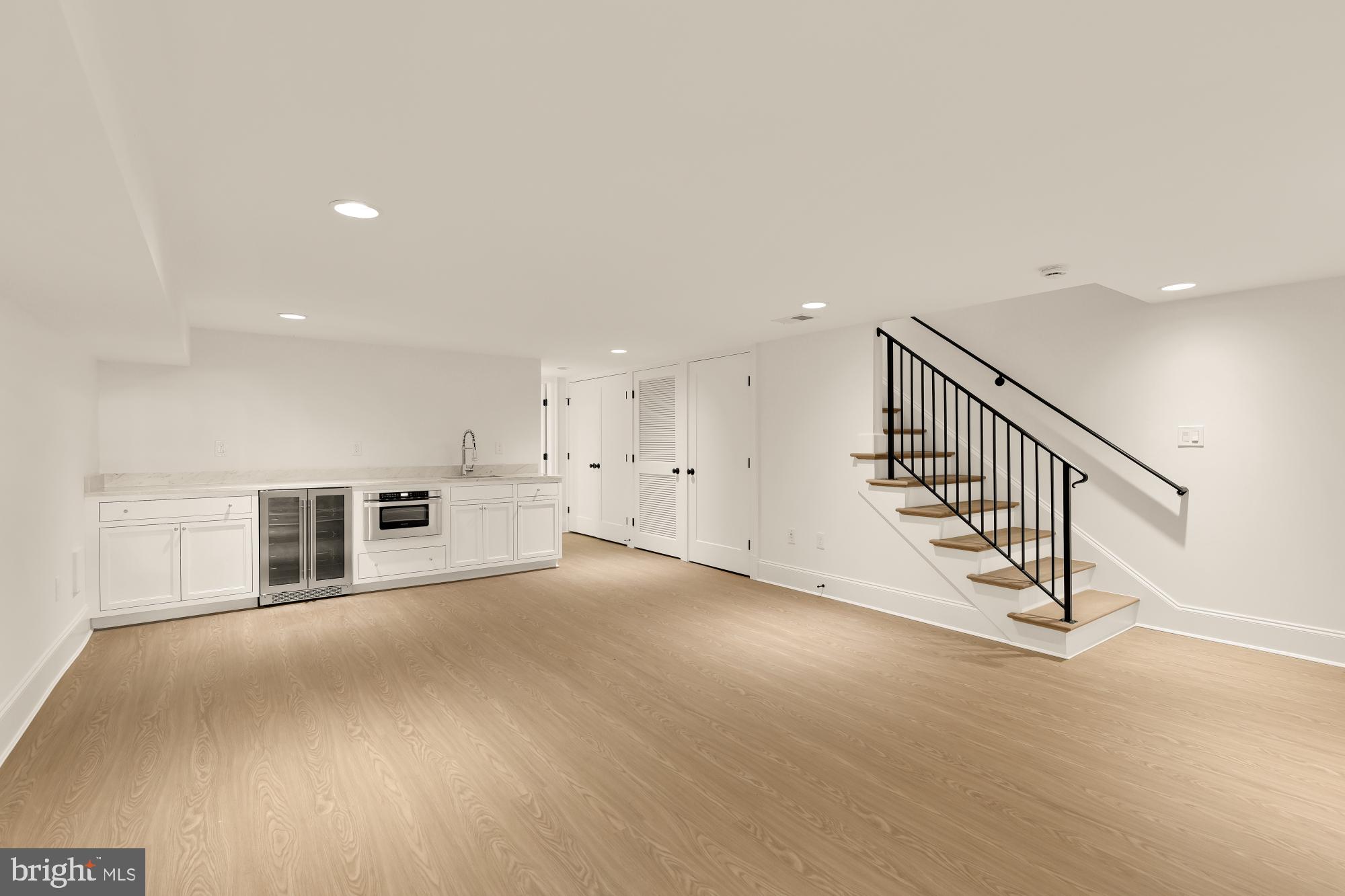 1412 Perry Place Northwest Washington, DC 20010 - Photo 39 of 52 a view of an empty room with stairs