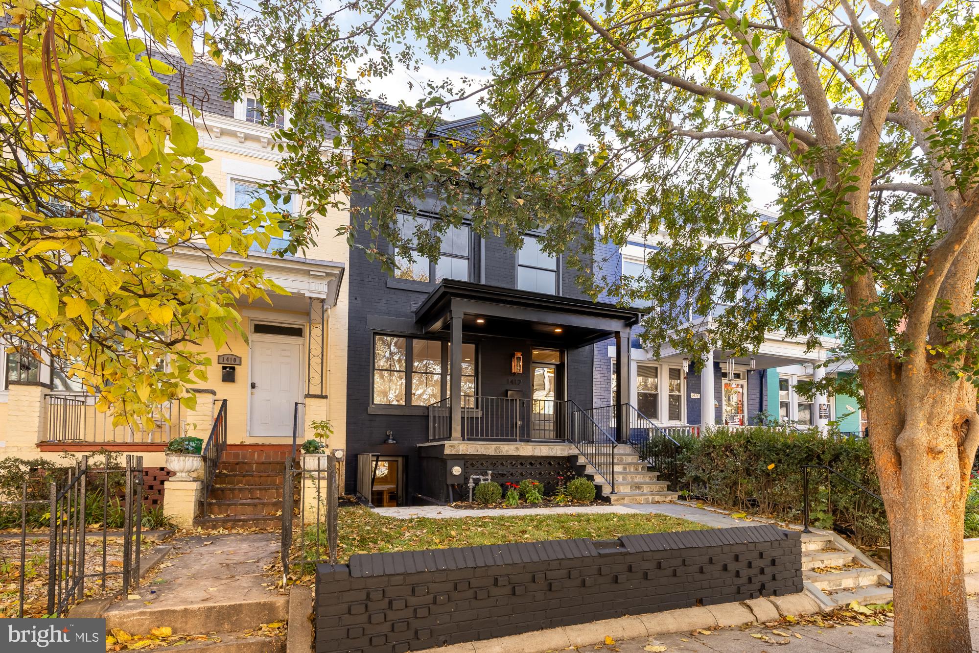 1412 Perry Place Northwest Washington, DC 20010 - Photo 52 of 52 a front view of a house with garden