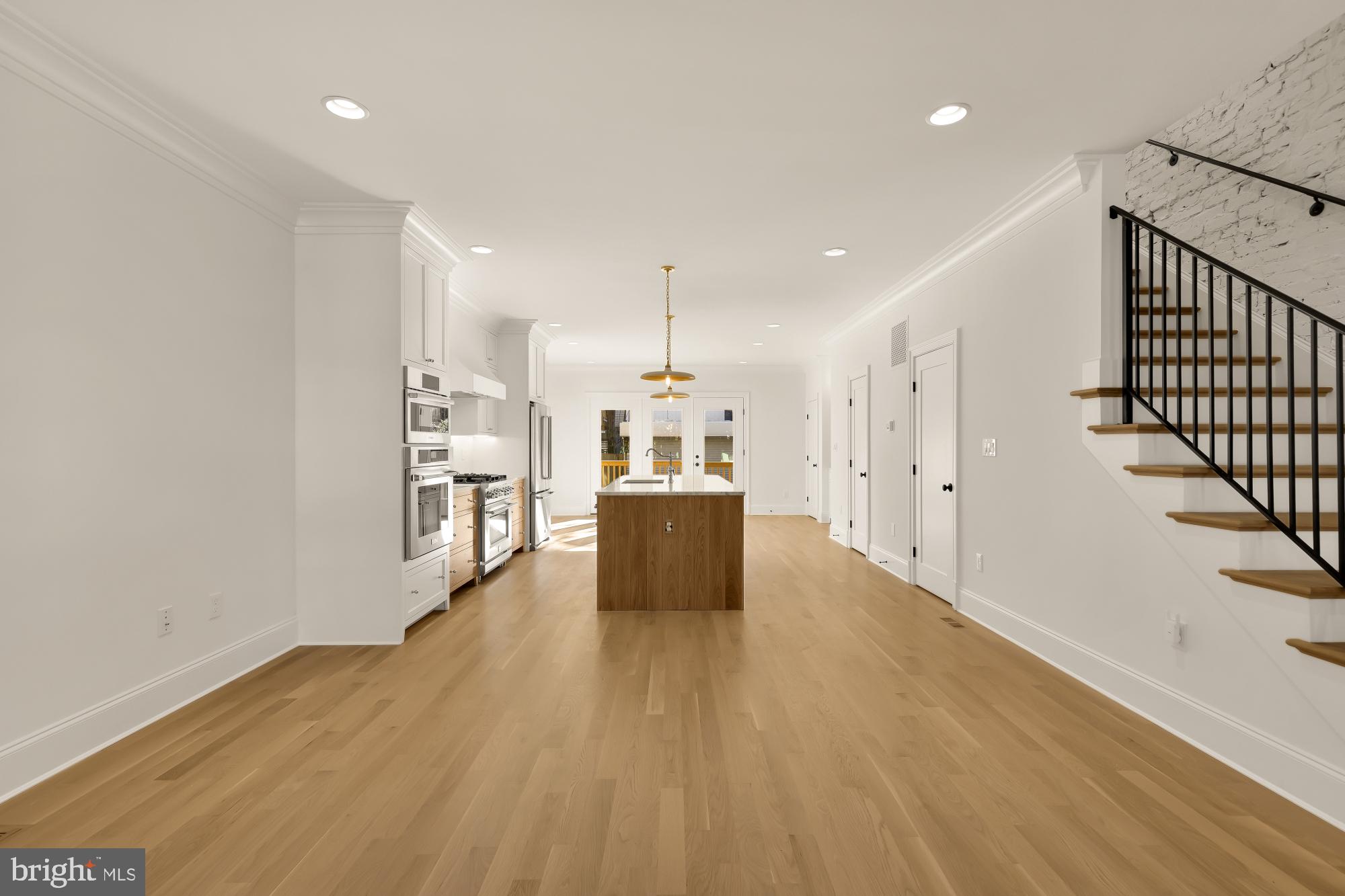 1412 Perry Place Northwest Washington, DC 20010 - Photo 8 of 52 a view of a kitchen with wooden floor and a window