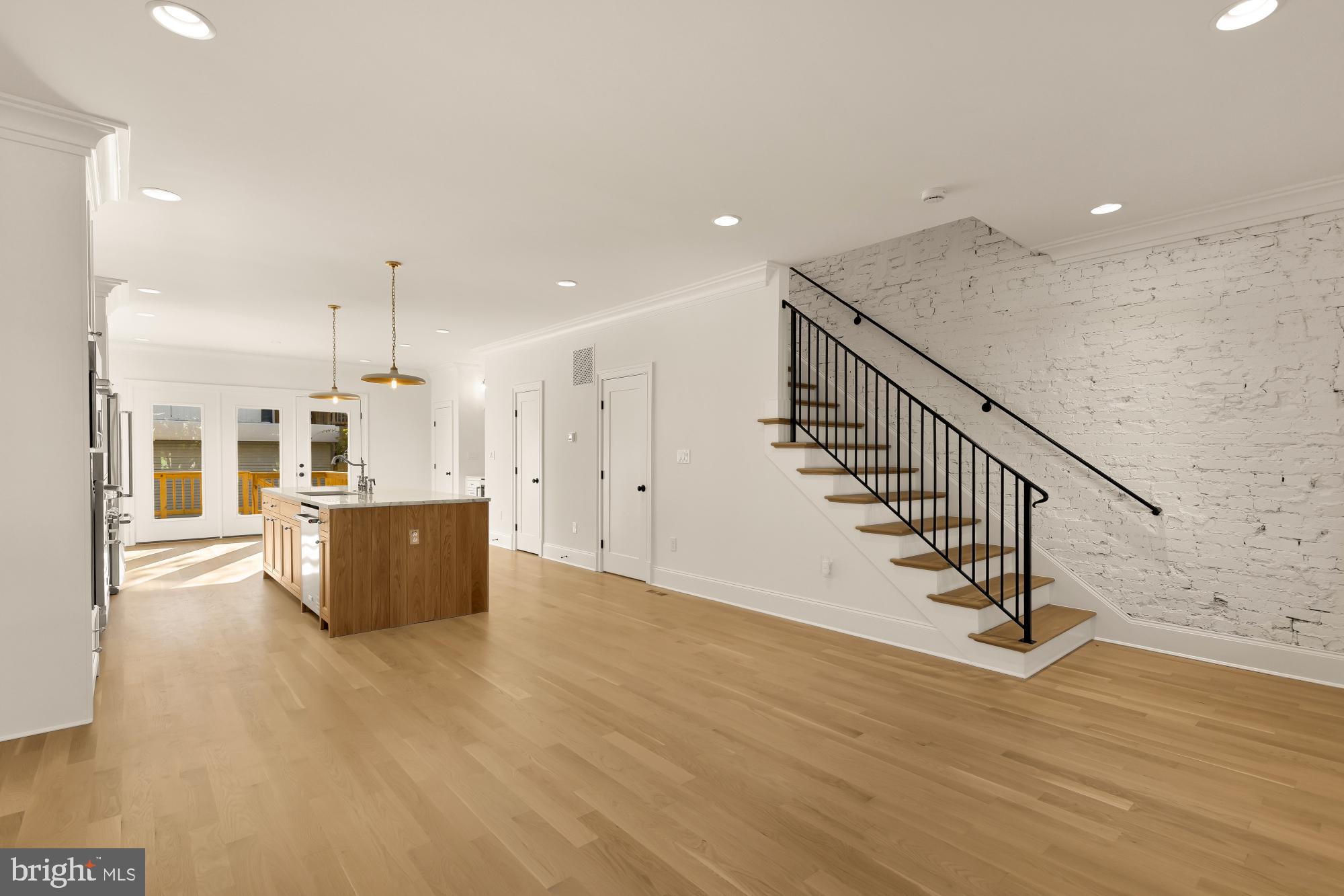 1412 Perry Place Northwest Washington, DC 20010 - Photo 9 of 52 a view of kitchen and hall with wooden floor