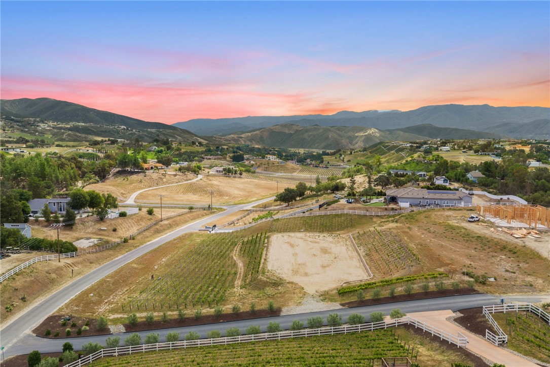 36191 Summit Circle Temecula, CA 92592 - Photo 22 of 33 a view of a swimming pool with a lake view