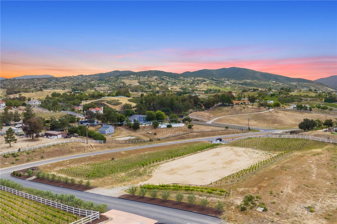 36191 Summit Circle Temecula, CA 92592 - Photo 3 of 33 a view of a swimming pool with mountains in the background