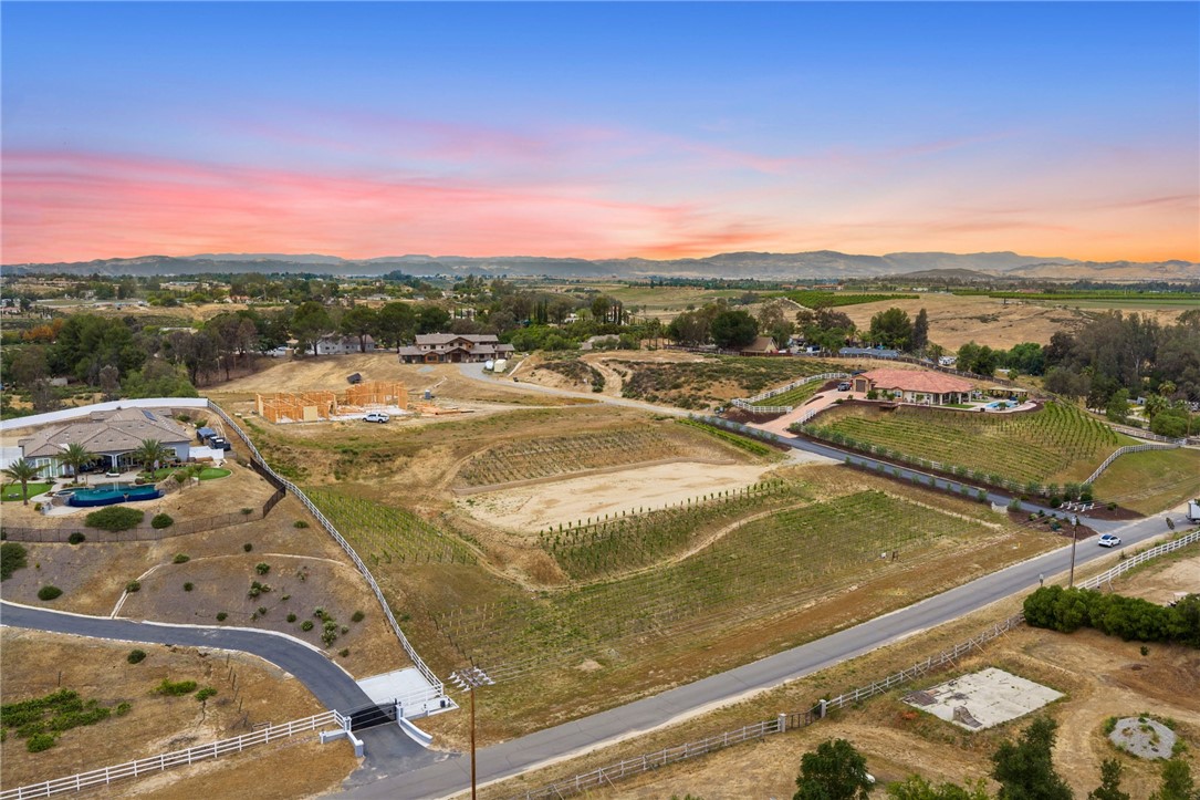 36191 Summit Circle Temecula, CA 92592 - Photo 31 of 33 a view of a pool with a yard
