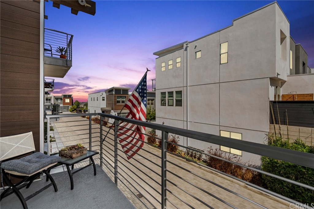1267 Westreef Costa Mesa, CA 92627 - Photo 24 of 34 a view of a balcony with chairs