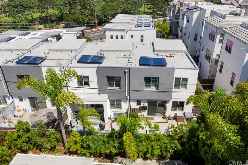 1267 Westreef Costa Mesa, CA 92627 - Photo 31 of 34 an aerial view of multiple houses with yard