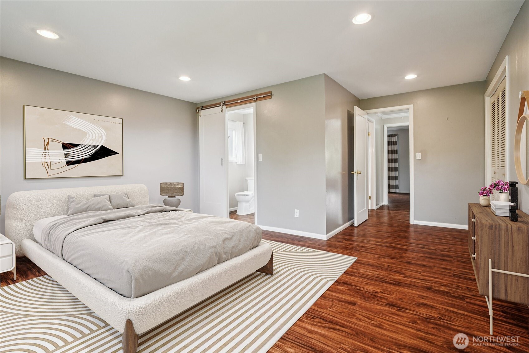 715 35th Street Everett, WA 98201 - Photo 17 of 36 a bedroom with a bed and wooden floor