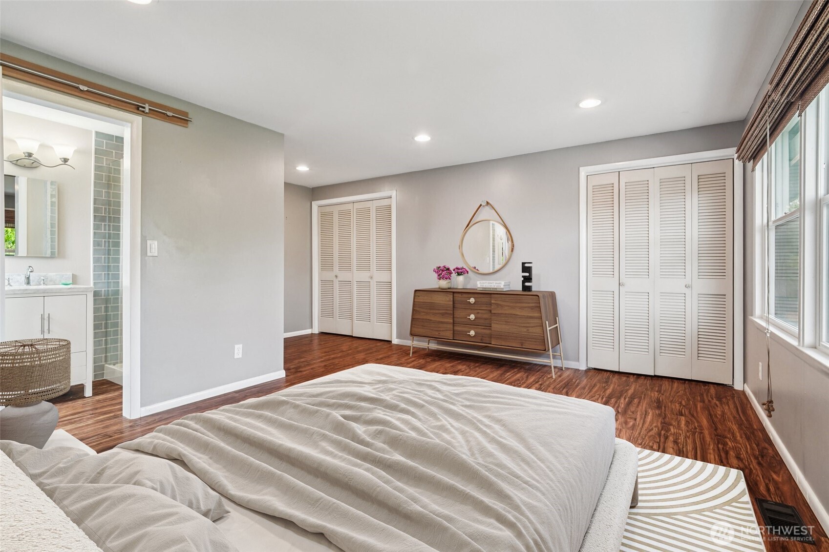 715 35th Street Everett, WA 98201 - Photo 18 of 36 a bed room with a bed mirror and a window