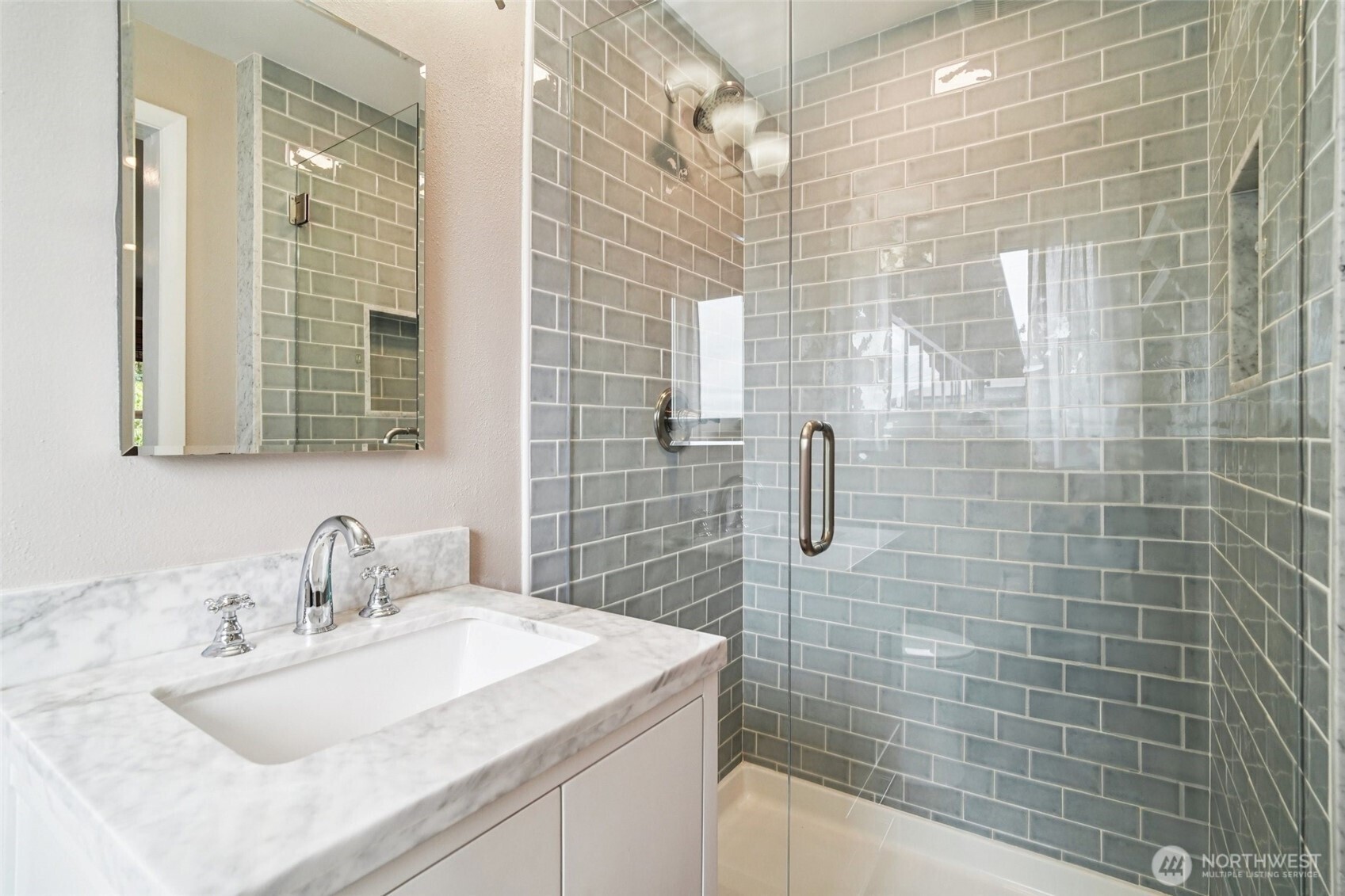 715 35th Street Everett, WA 98201 - Photo 19 of 36 a bathroom with a sink shower and a mirror