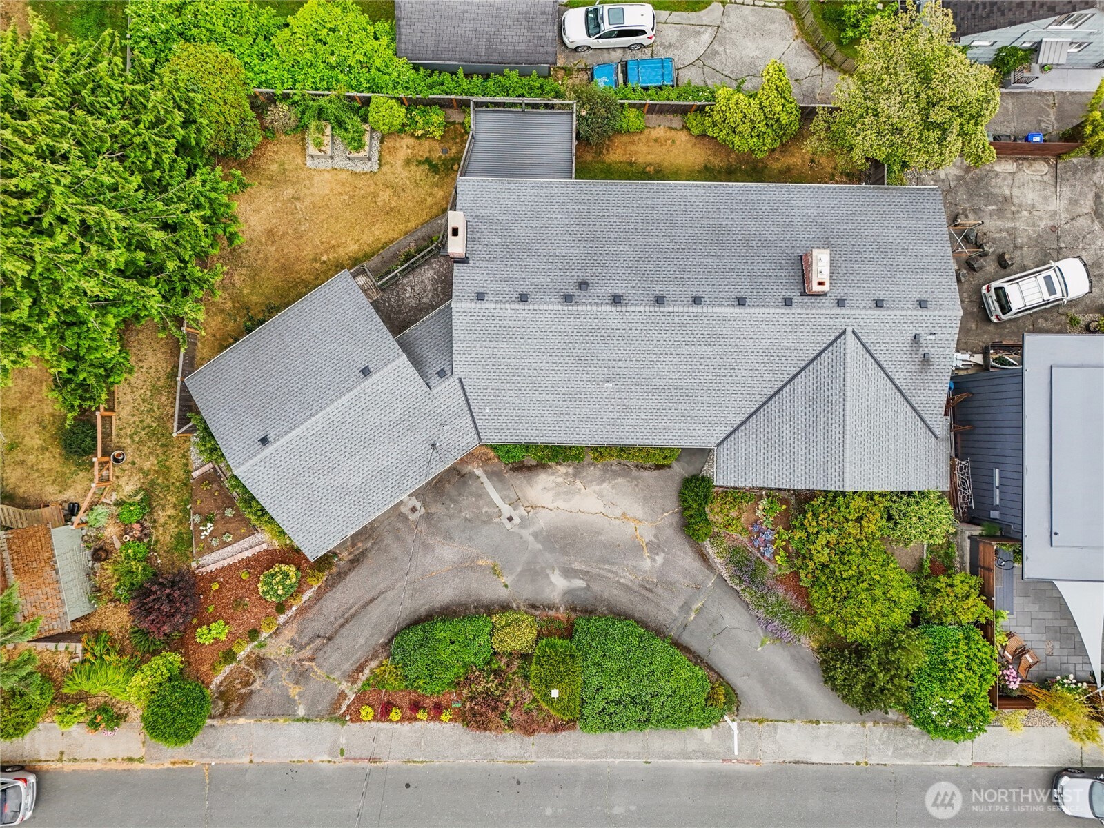 715 35th Street Everett, WA 98201 - Photo 3 of 36 an aerial view of a house with a yard