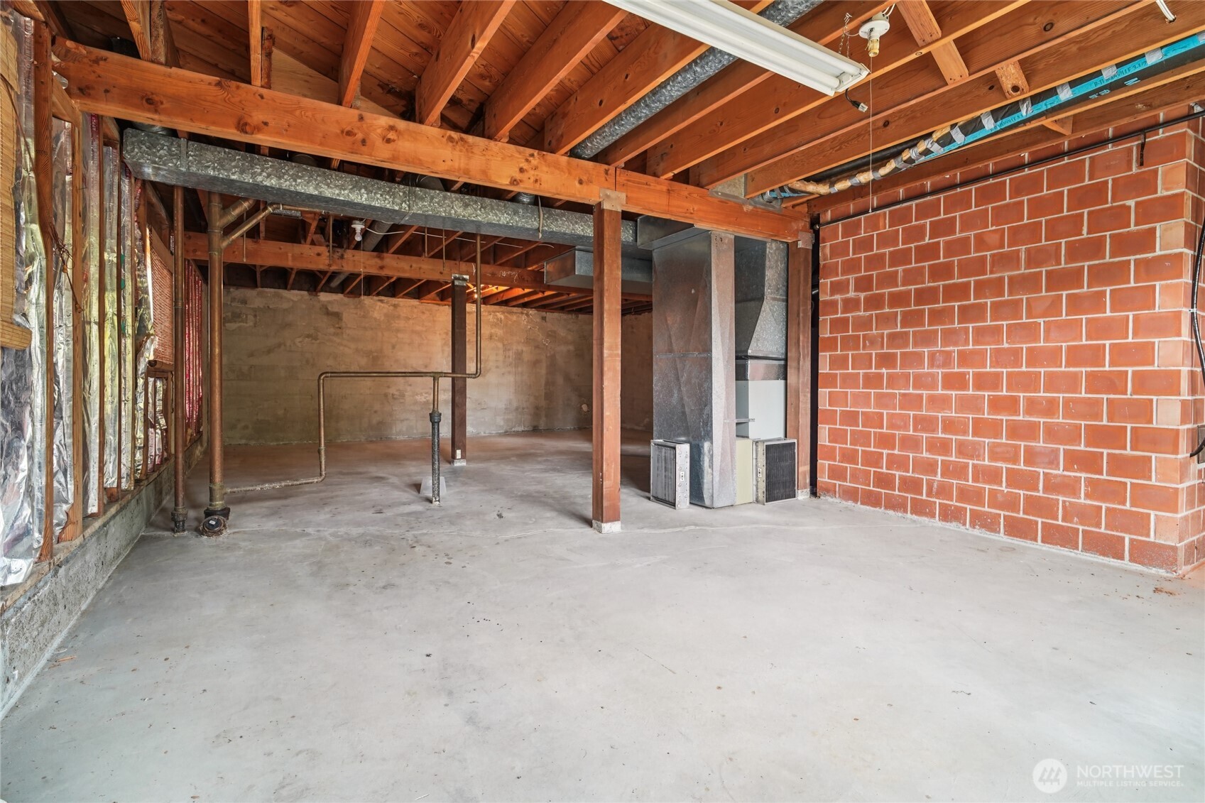 715 35th Street Everett, WA 98201 - Photo 31 of 36 a view of an empty room with a garage