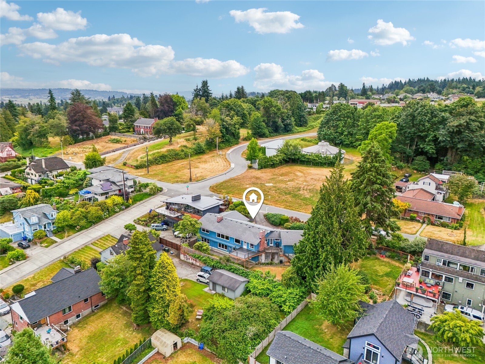 715 35th Street Everett, WA 98201 - Photo 35 of 36 an aerial view of residential houses with outdoor space and street view