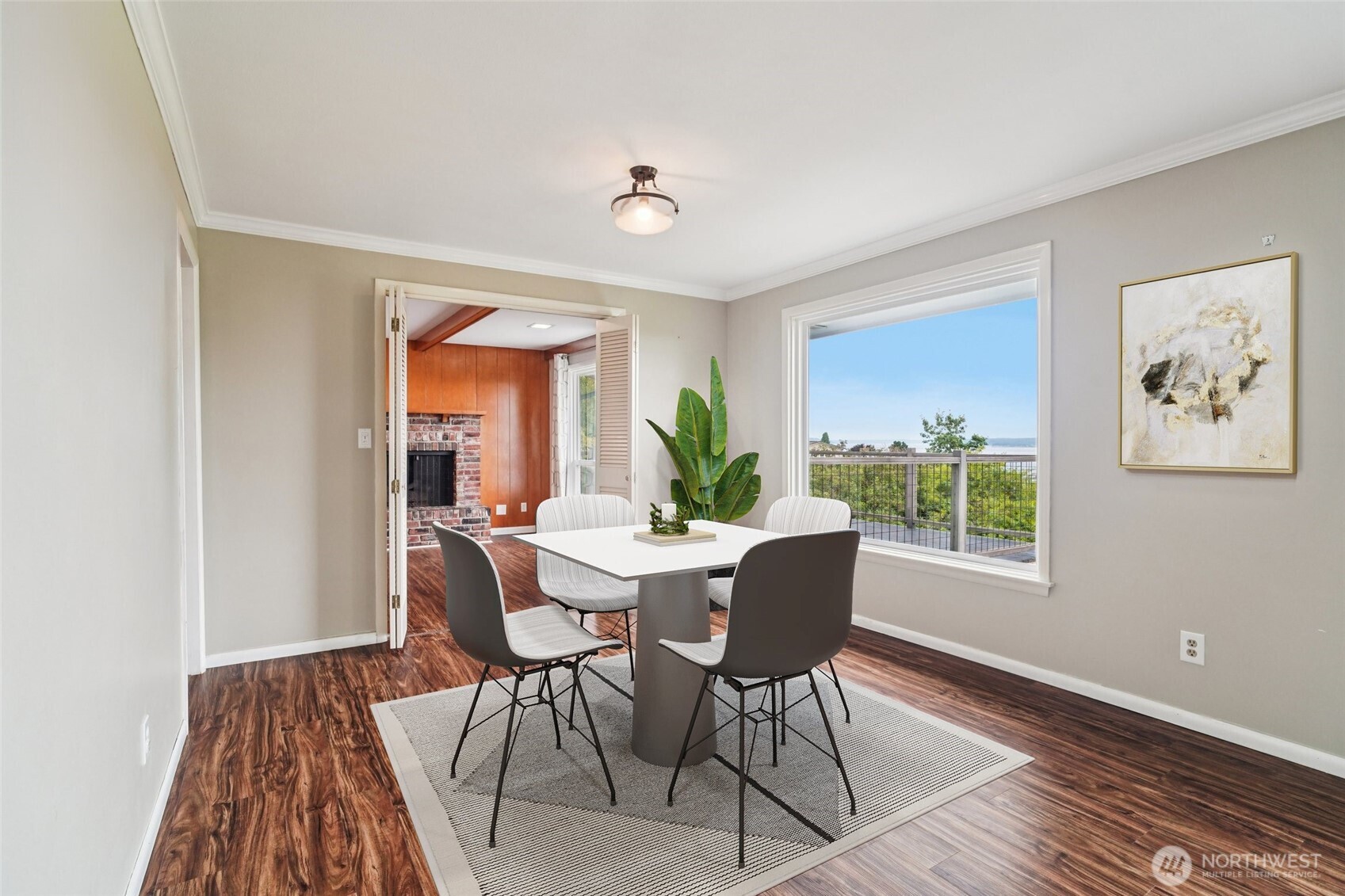 715 35th Street Everett, WA 98201 - Photo 7 of 36 a view of a dining room with furniture window and wooden floor