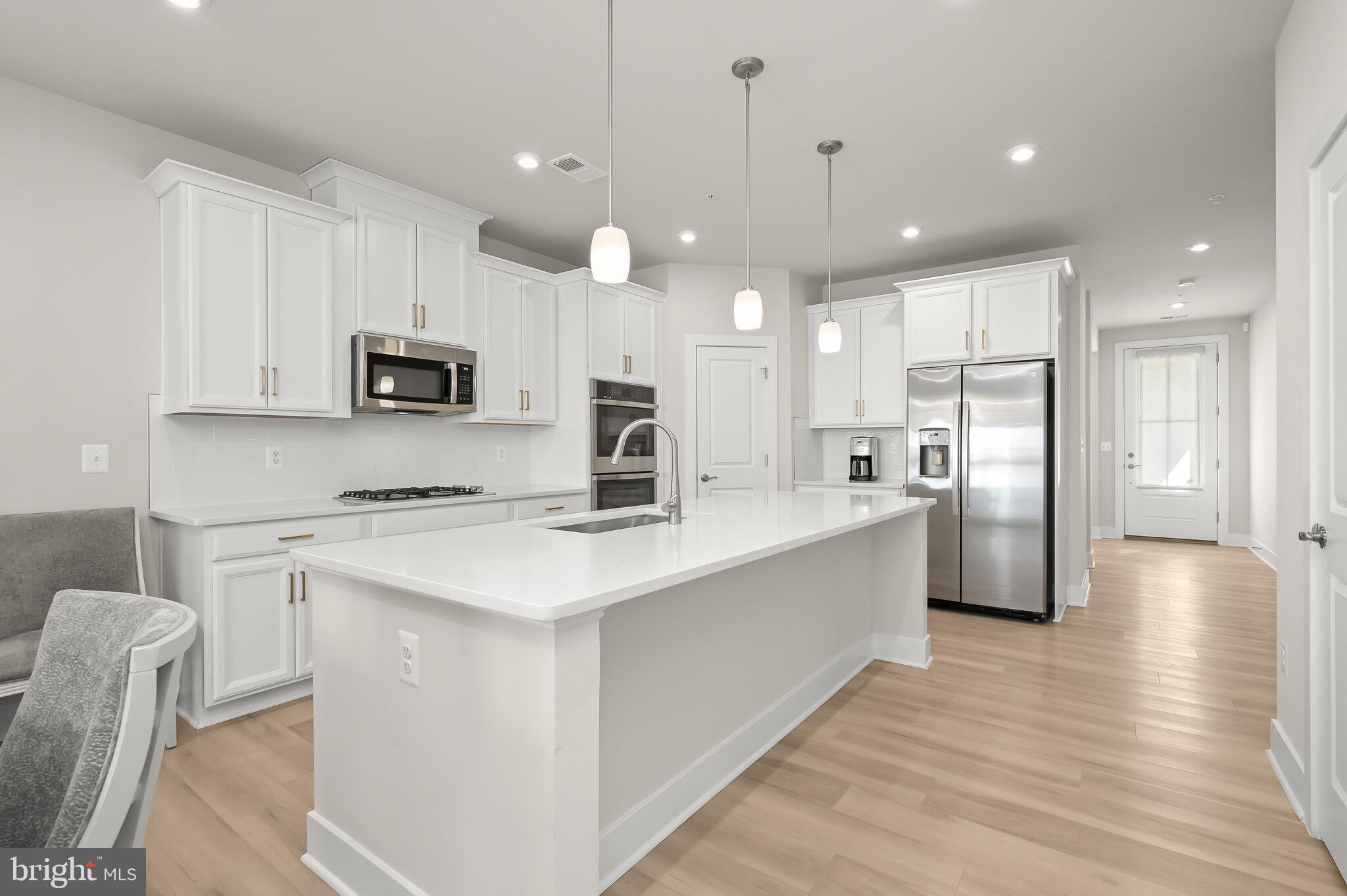 22112 Plover Street Clarksburg, MD 20871 - Photo 11 of 46 Oversized island with prep sink & breakfast bar