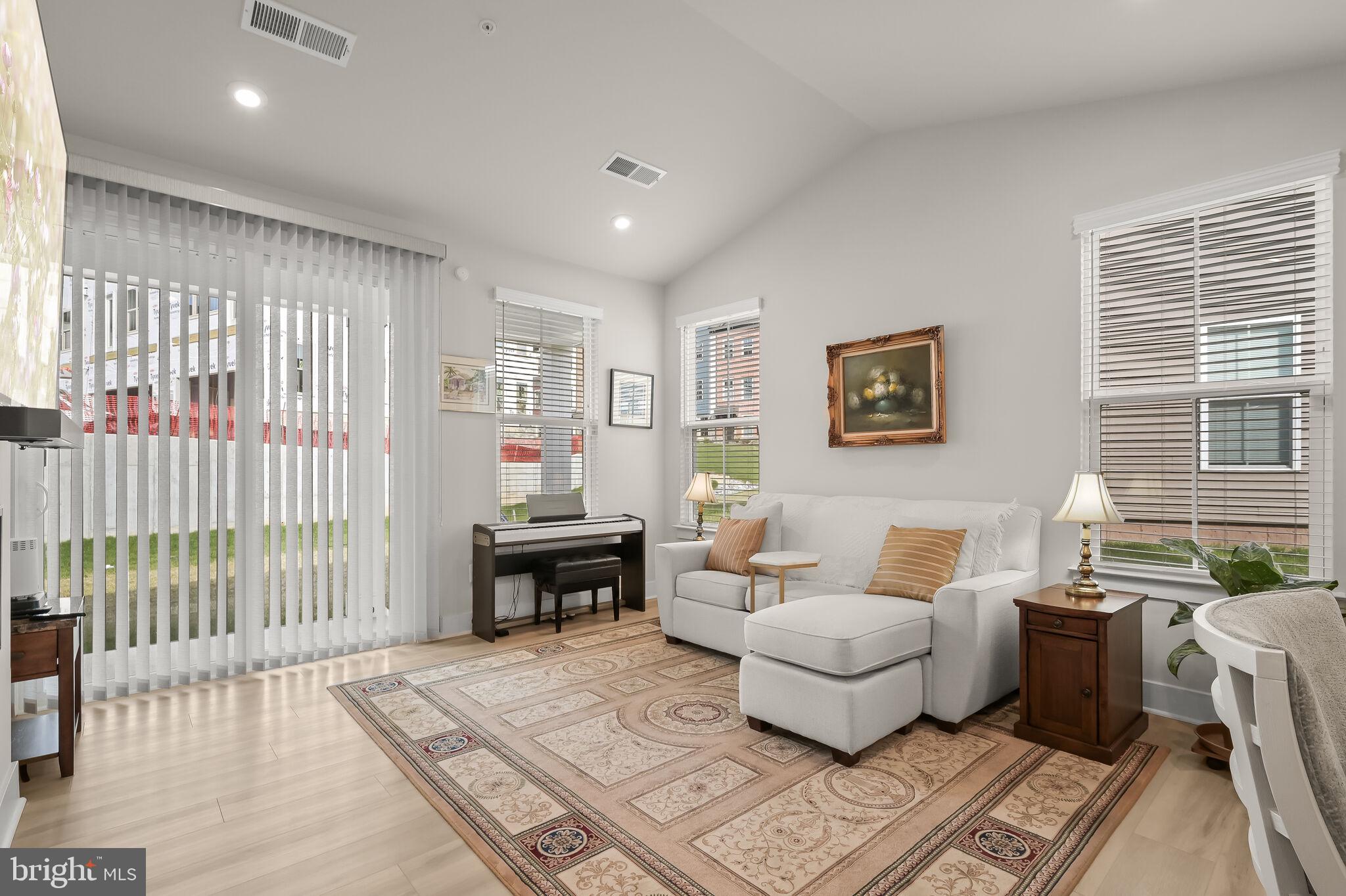 22112 Plover Street Clarksburg, MD 20871 - Photo 15 of 46 Living room offers patio access