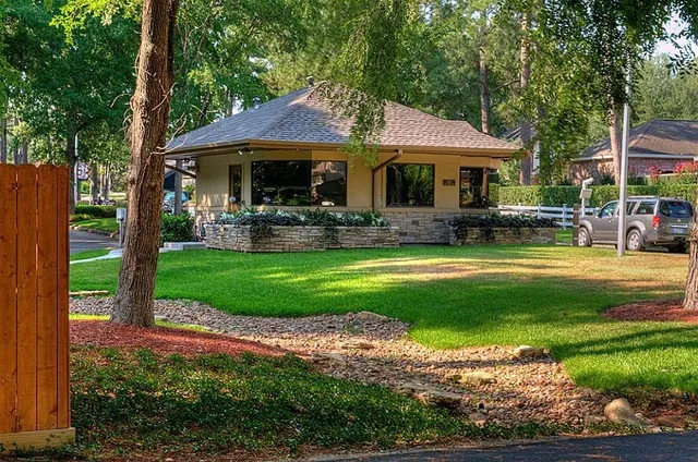 a view of a garden with an outdoor space