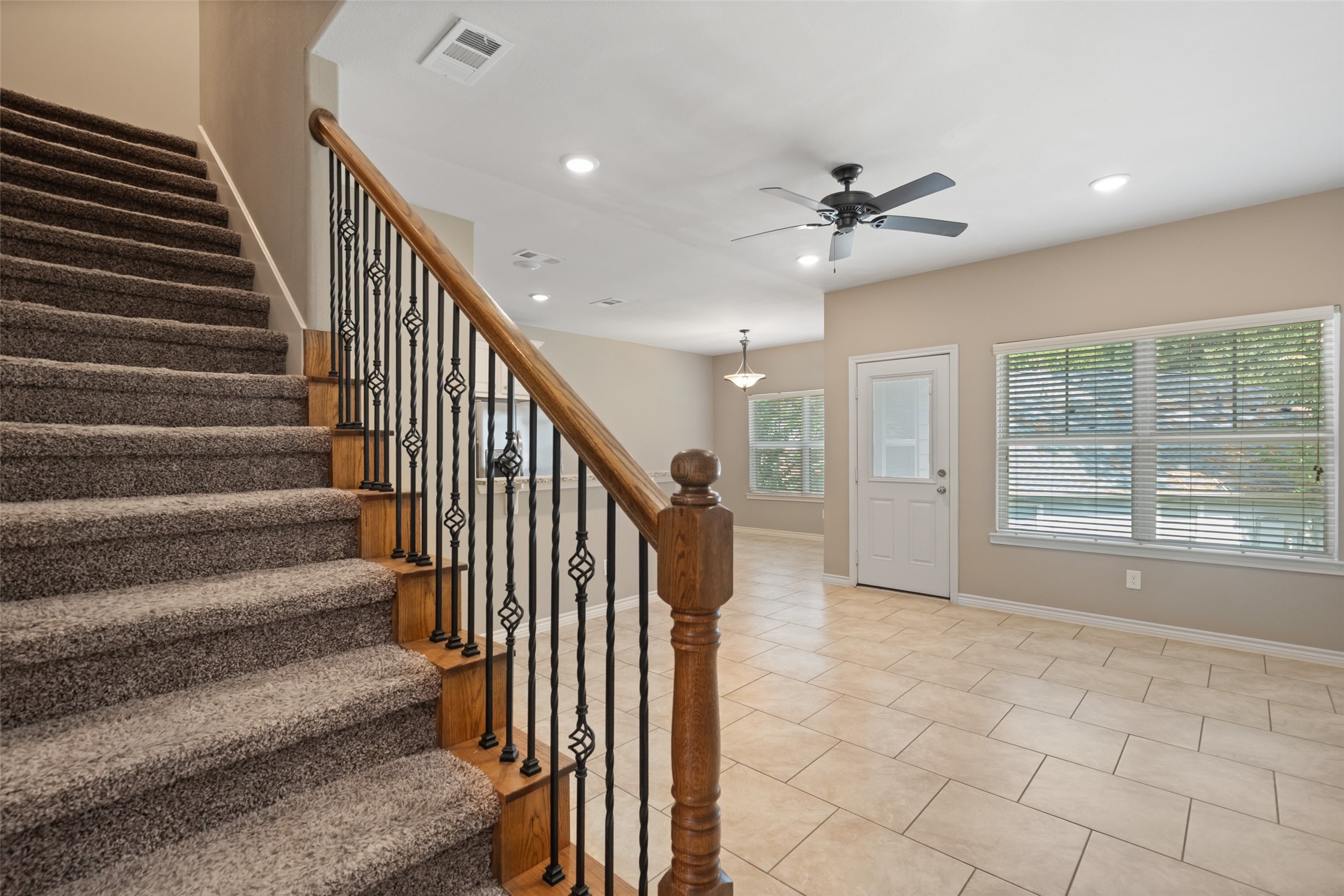 1413 East April Villa, Unit B Conroe, TX 77356 - Photo 5 of 33 a view of entryway and hall with wooden floor