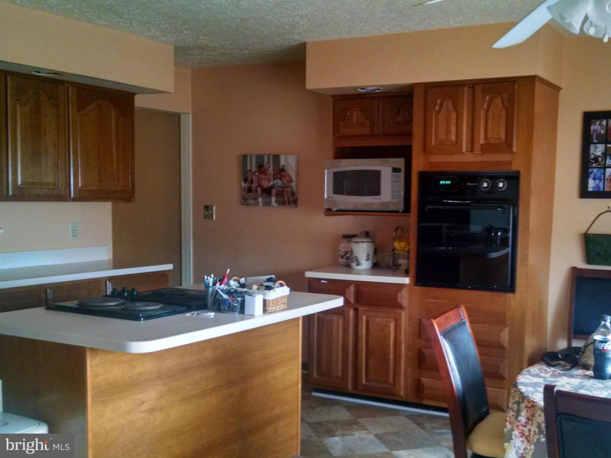 1679 Grandview Road Pasadena, MD 21122 - Photo 13 of 25 Bright, inviting kitchen