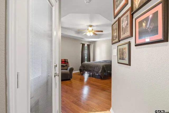 a view of living room with furniture and a chandelier