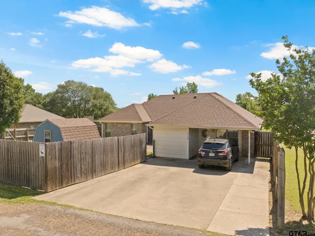a car parked in front of a house