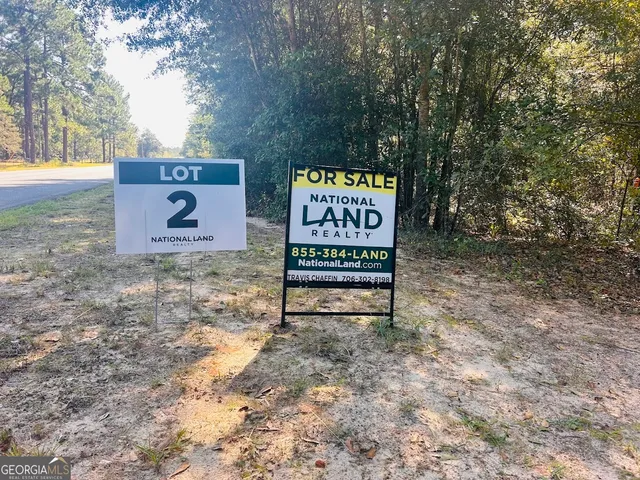 a sign on the side of the road